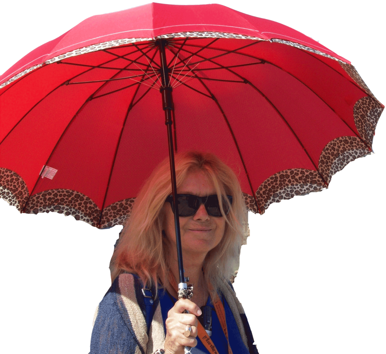 Nicole Samuel with her umbrella at Caesarea harbor